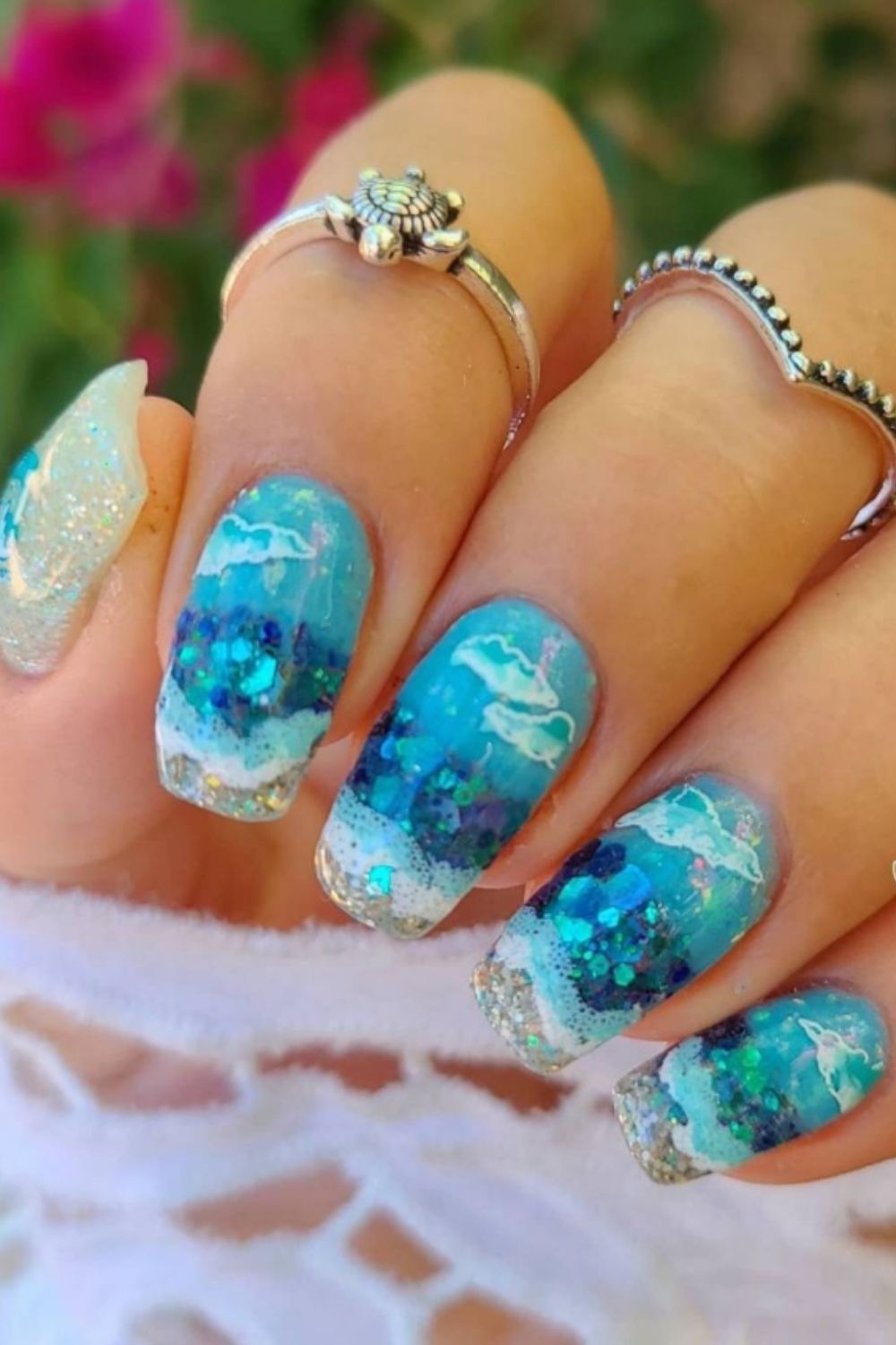 Short glitter and blue Beach Nail Designs