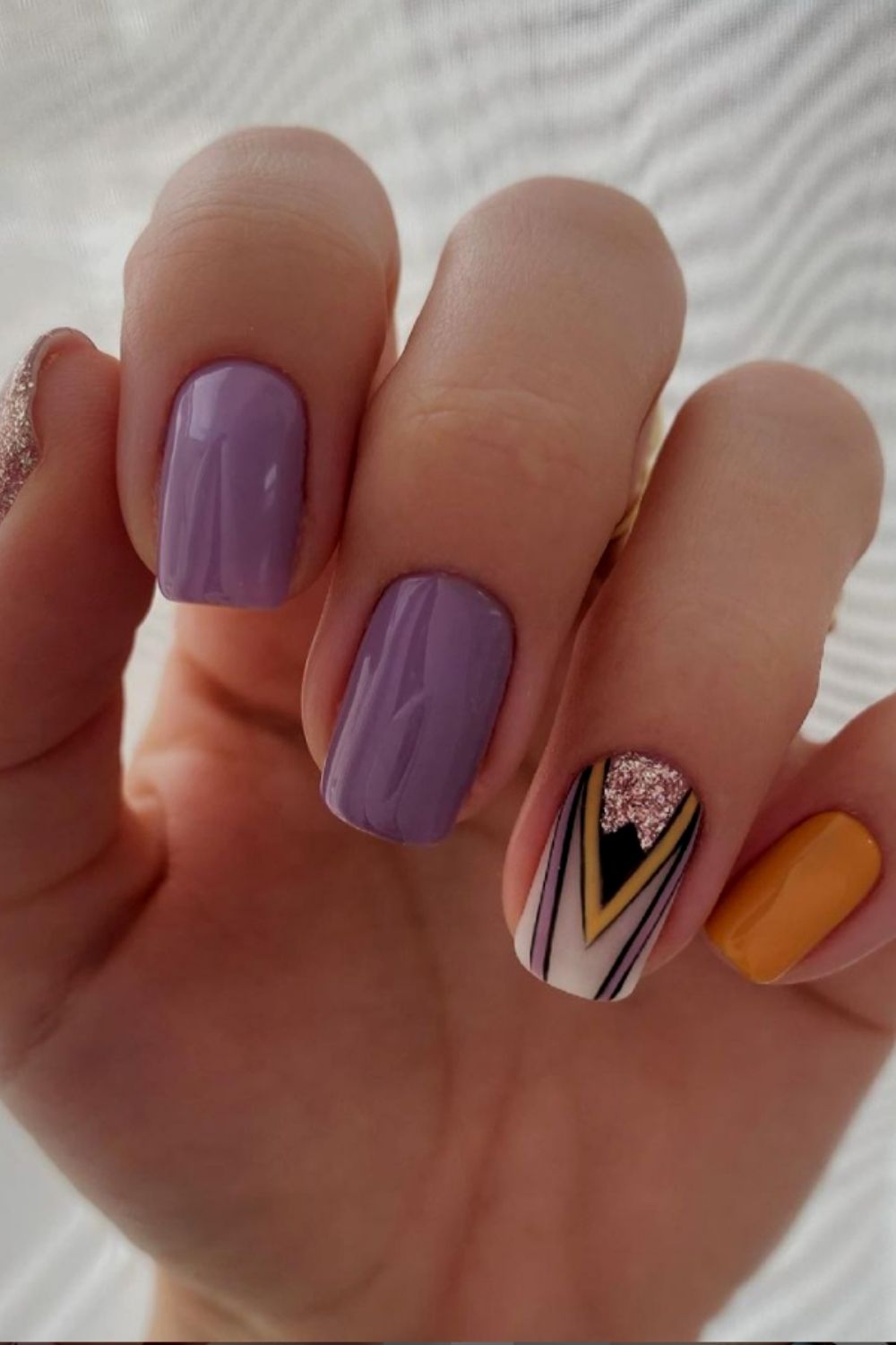 Purple and gold nails designs