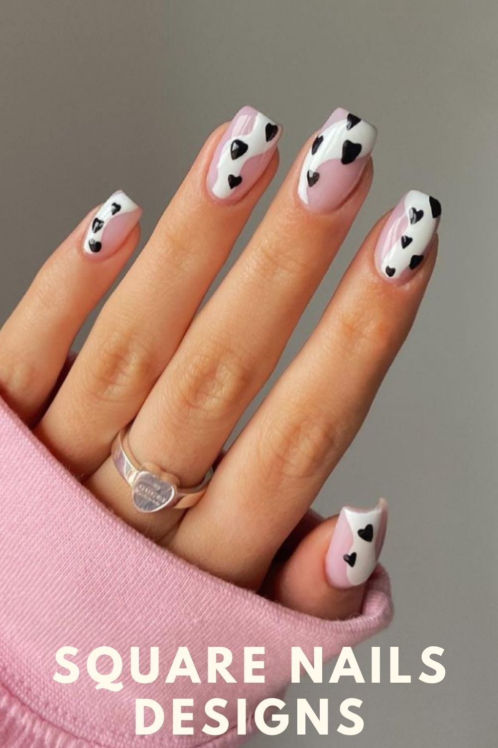 White and pink square acrylic nails with black love heart