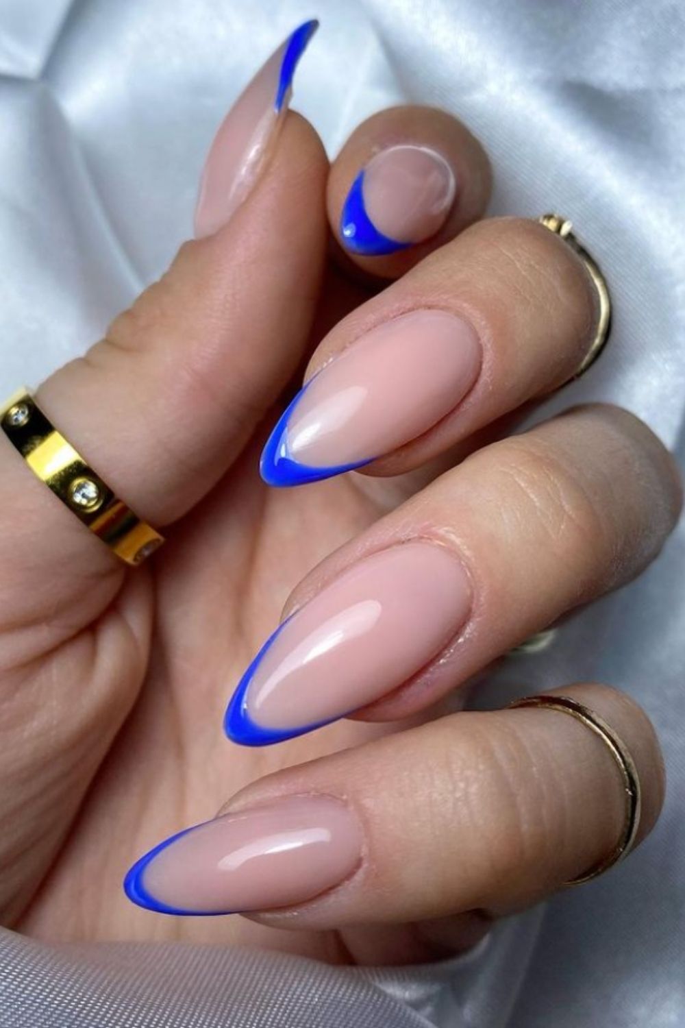 Blue tip almond-shaped nail