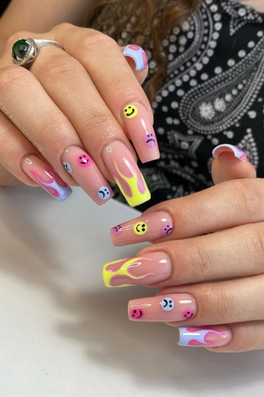 Yellow and pink coffin nail art design with smiley face