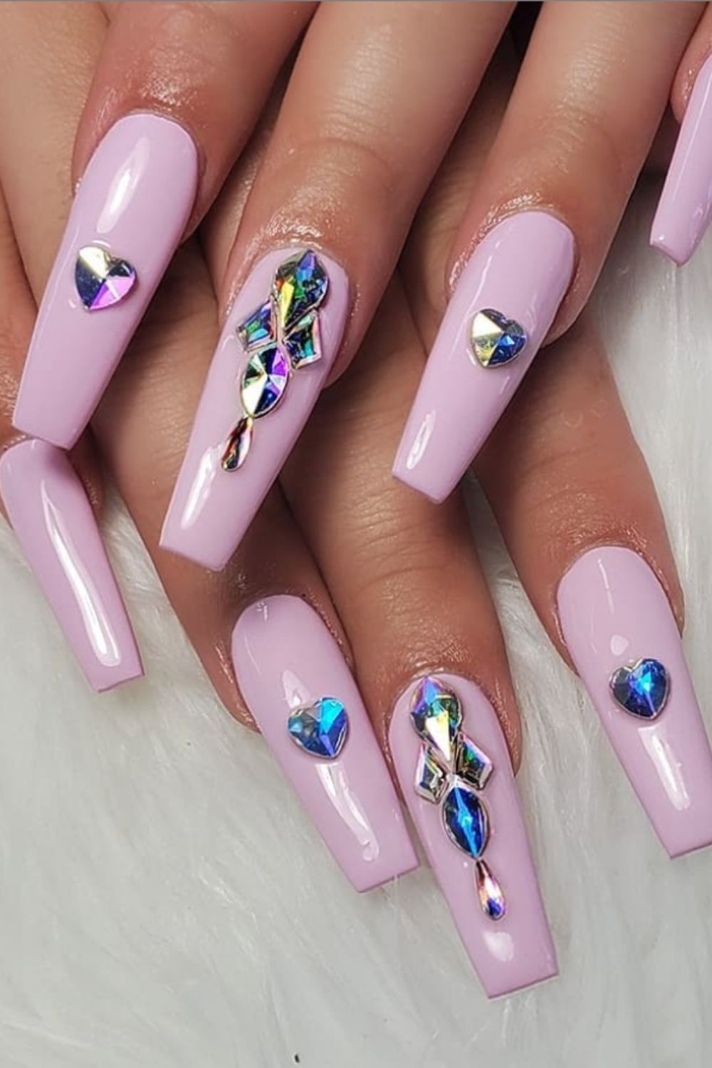 Soft pink nails with rhinestones