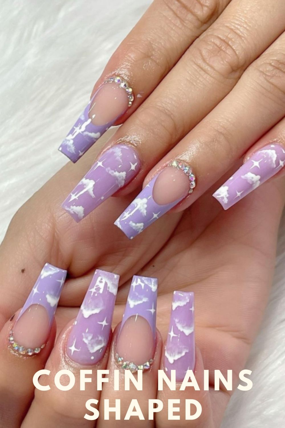 Purple coffin nail with white clouds