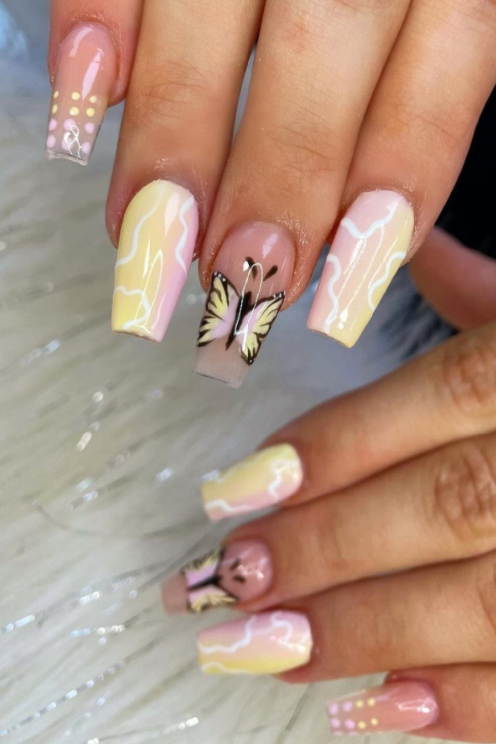 Yellow and pink nails art