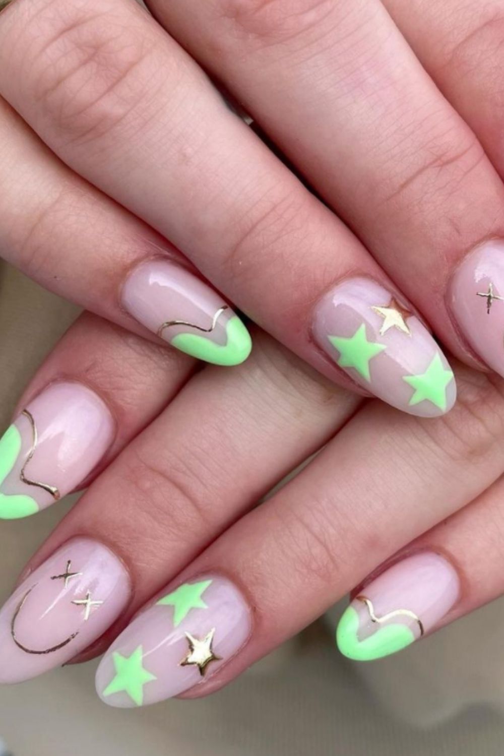 Gold stars and neon almond nails art for summer nails