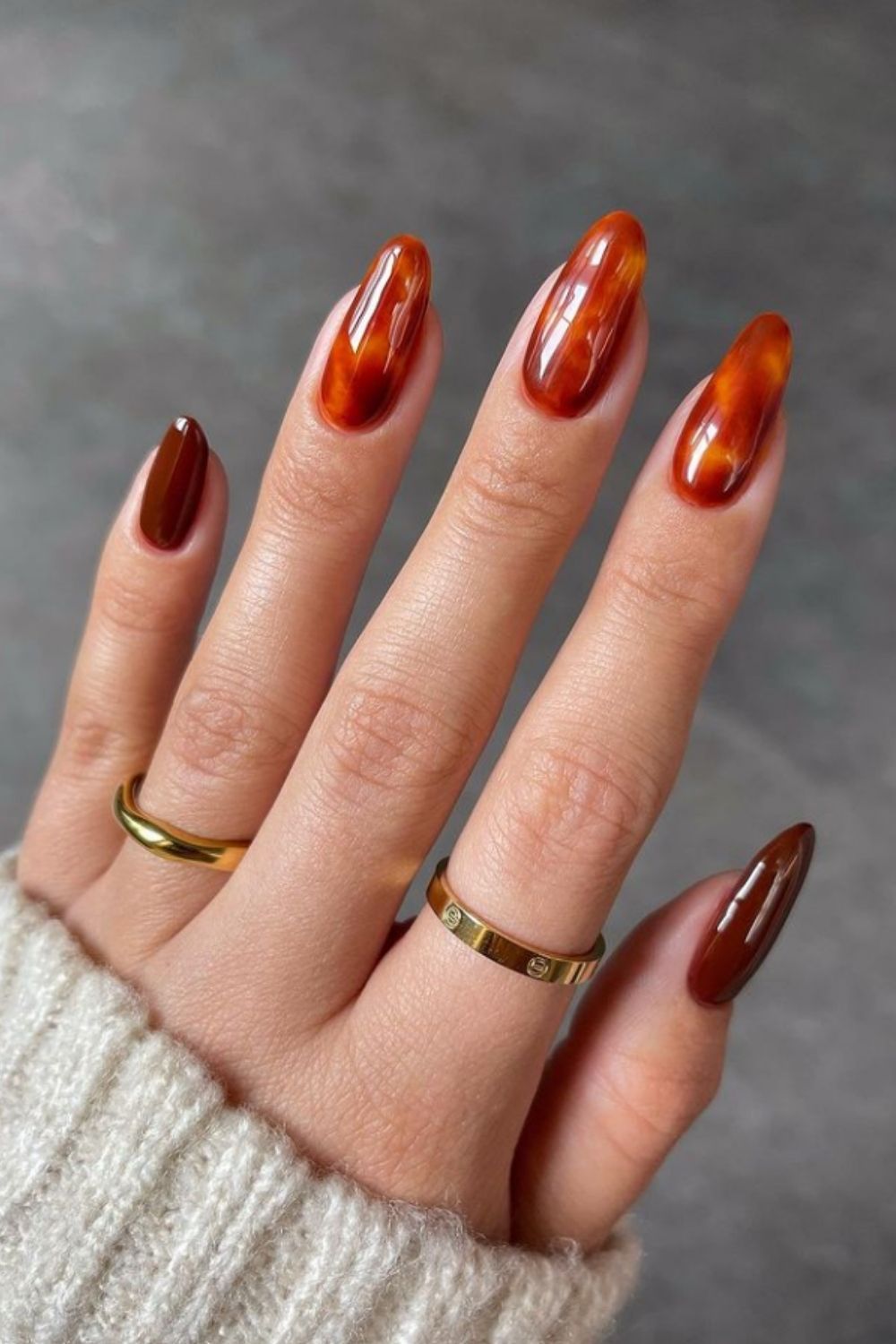 Very beautiful brown almond shaped nail design