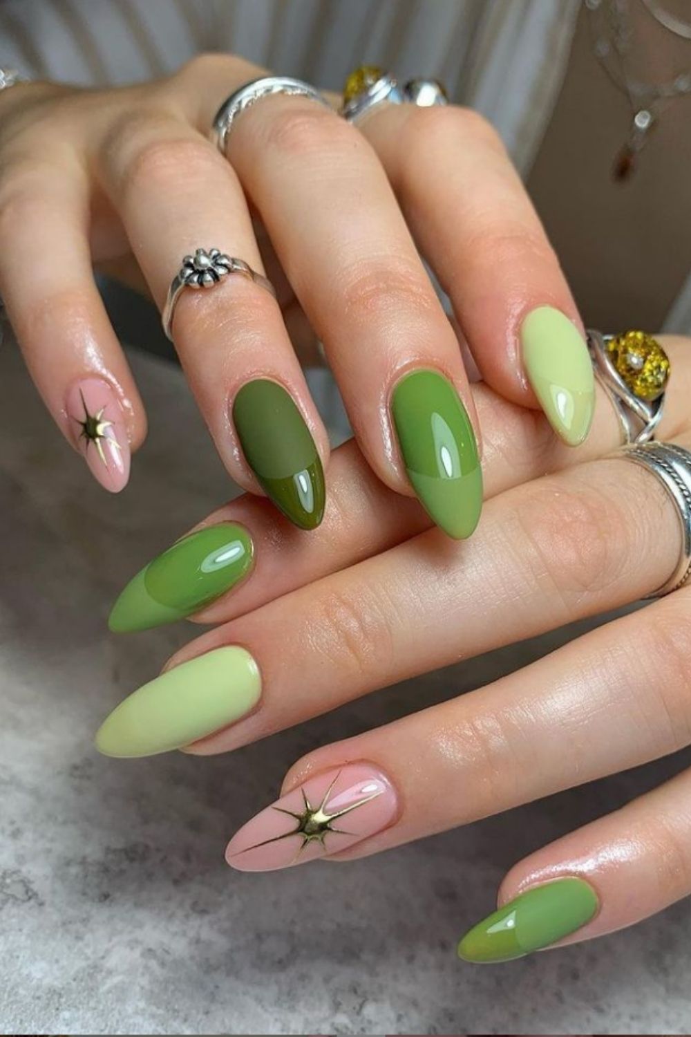 Green acrylic almond nails design