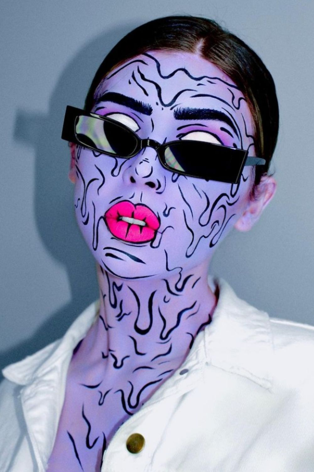 Fluorescent and black to create humorous makeup