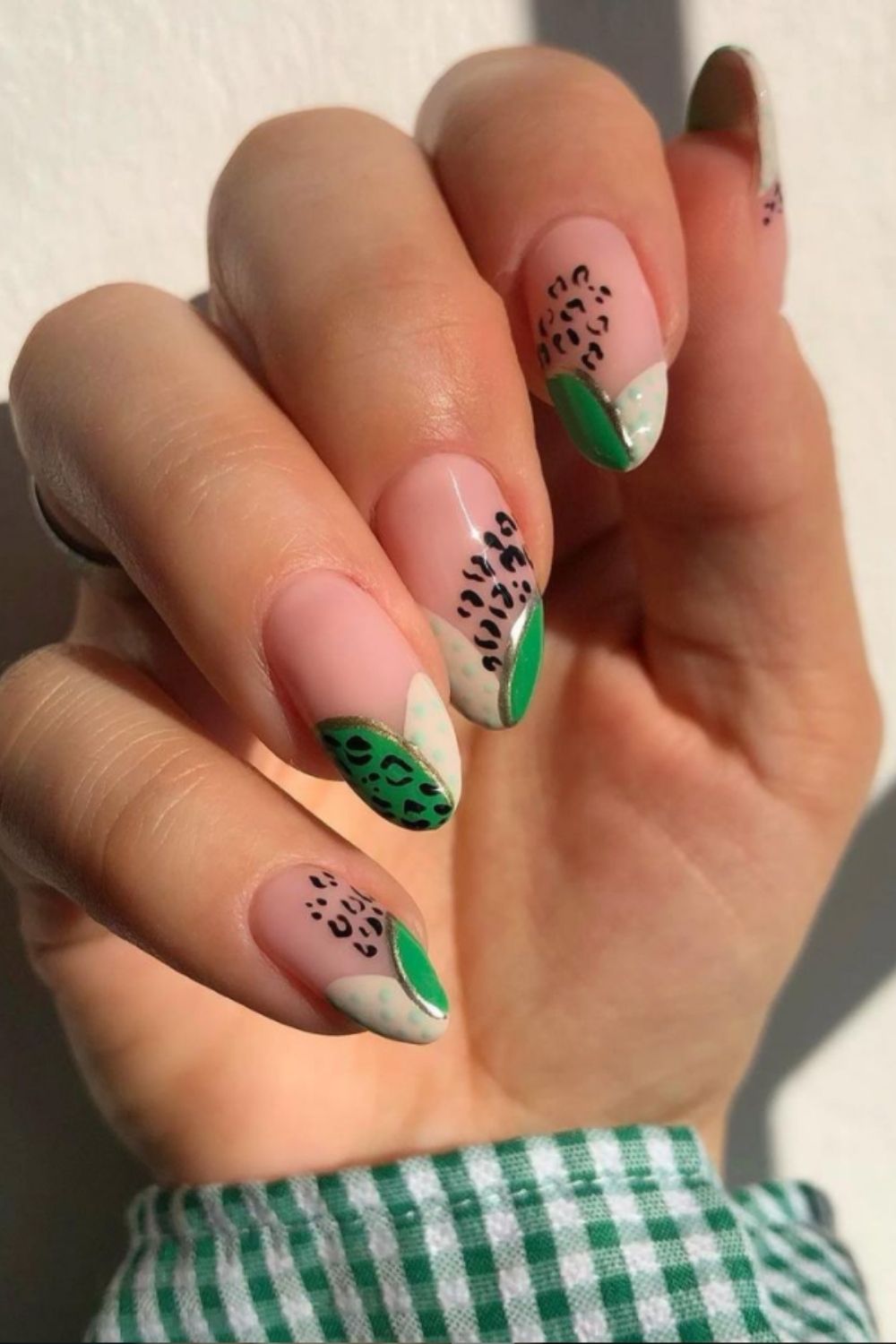 Green and white French tip almond nails