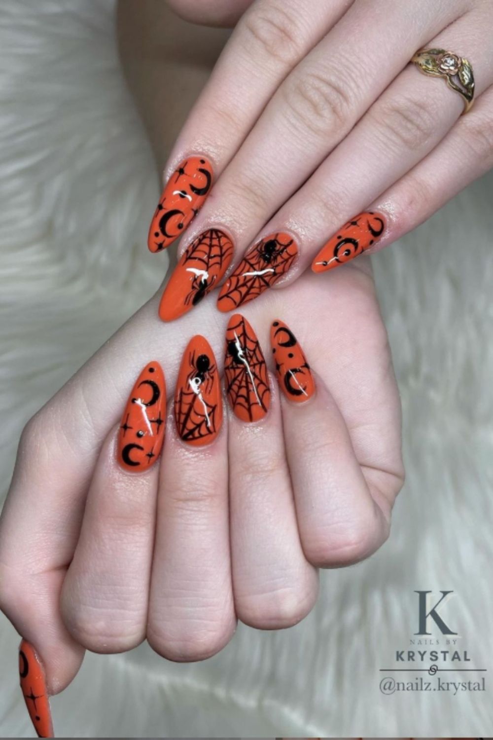 Black and orange almond nails whie moon and spider