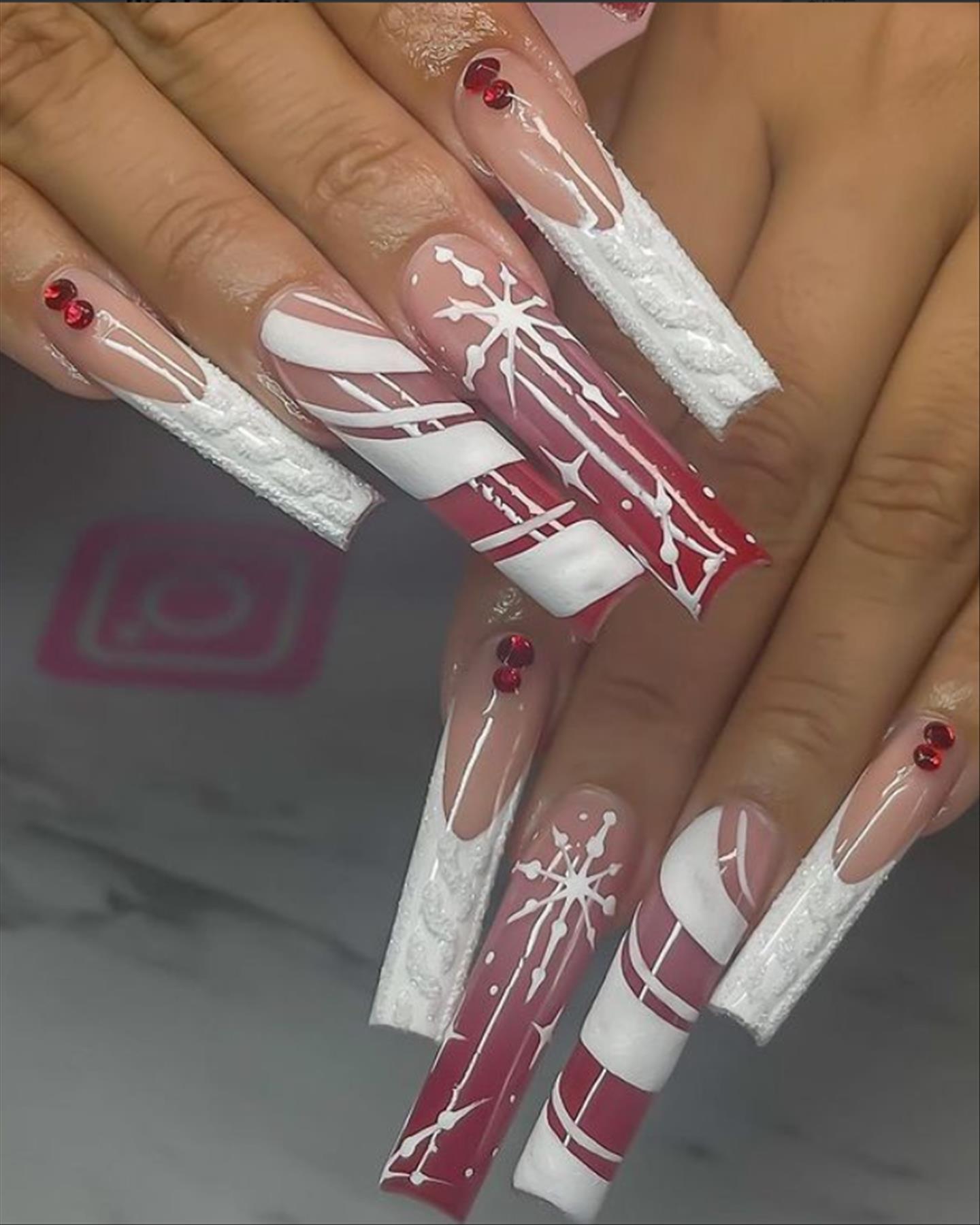 Elegant Christmas acrylic nails with snowflake nails